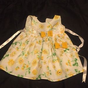 An adorable babies dress